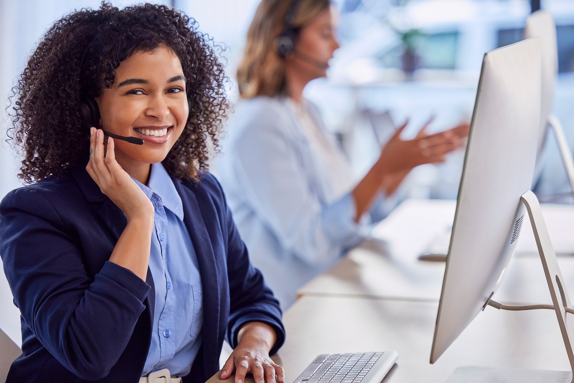 Contact us, call center or portrait of friendly consultant woman by computer in communications comp